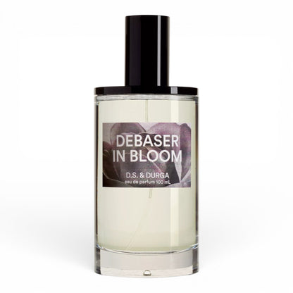 DS and Durga Debaser in Bloom perfume bottle on white background