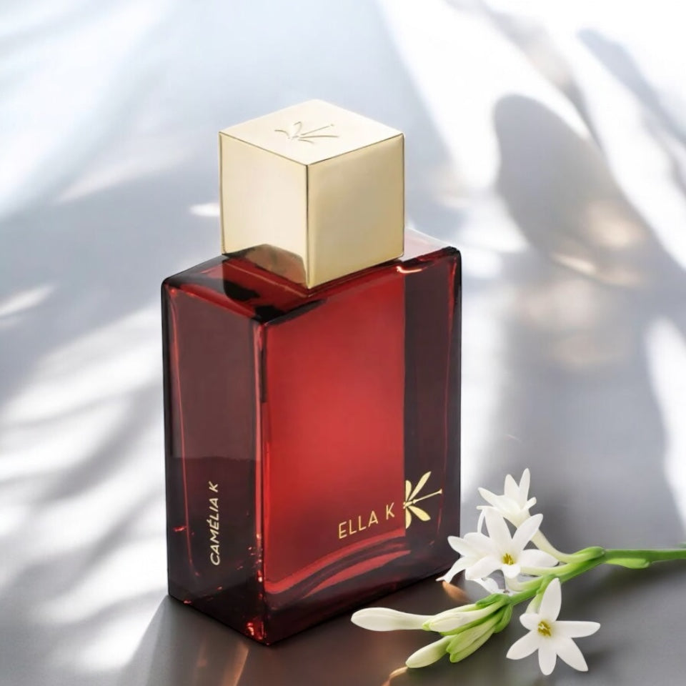 Ella K Camelia K perfume sample – rich floral and red fruit scent, styled with glowing sunlight and fresh orange blossom.