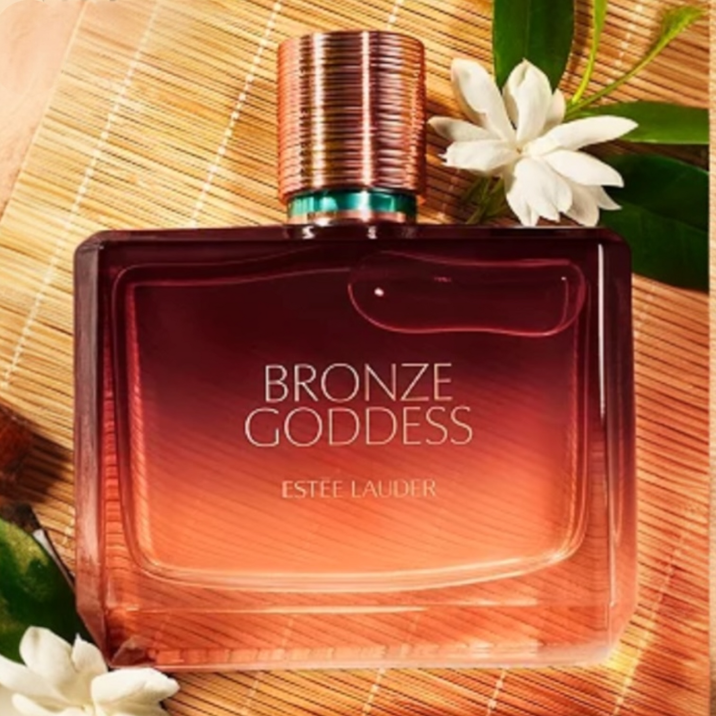 Estée Lauder Bronze Goddess Eau de Parfum styled in a sunlit, beach-inspired setting