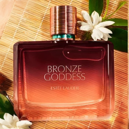 Estée Lauder Bronze Goddess Eau de Parfum styled in a sunlit, beach-inspired setting