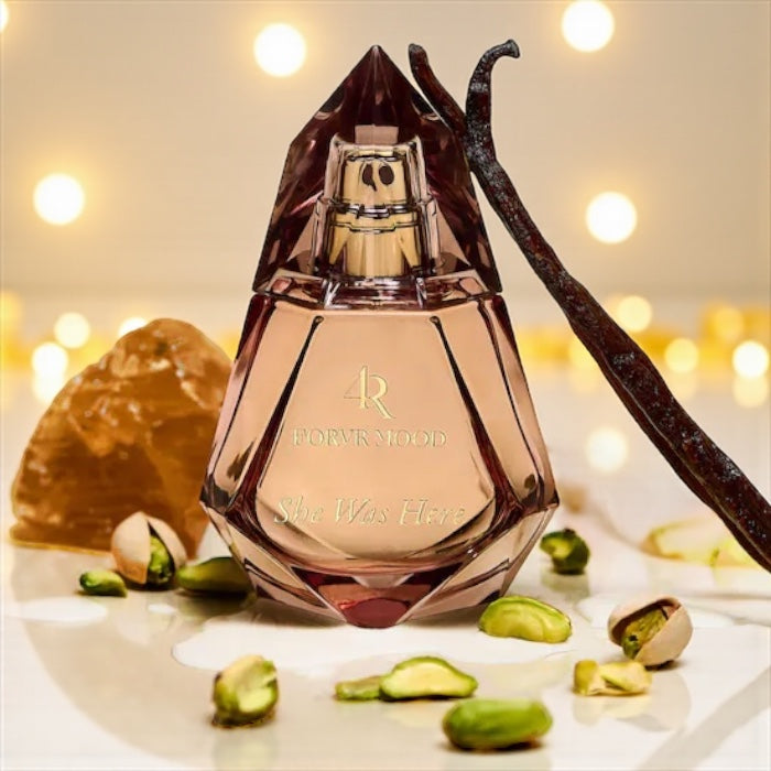 FORVR Mood She Was Here perfume sample – roasted pistachio, vanilla milk and rose fragrance in a warm, golden-toned setting.