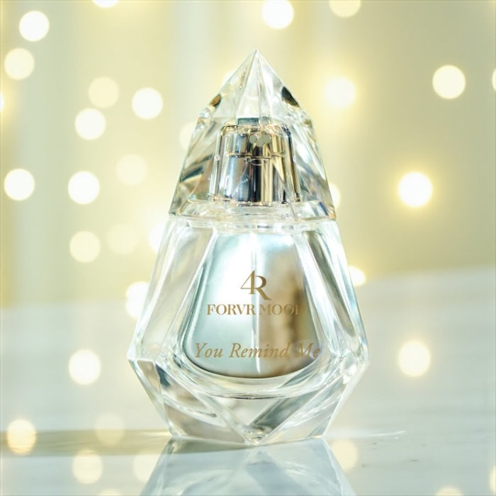 FORVR Mood You Remind Me perfume sample – apricot, orange blossom, and soft musk notes styled in a warm, intimate setting.