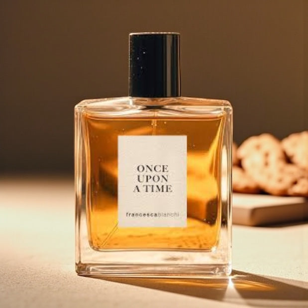 Francesca Bianchi Once Upon A Time perfume sample styled in a soft cosy setting to highlight its mandarin, vanilla and candy cotton notes.