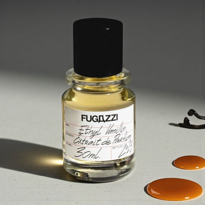 Fugazzi Ethyl Vanillin perfume sample styled with vanilla pods and caramel tones to highlight its sweet warm character.