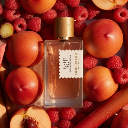 Goldfield & Banks Sunset Hour styled with quandong peach, raspberries, rhubarb glowing in golden sunset light