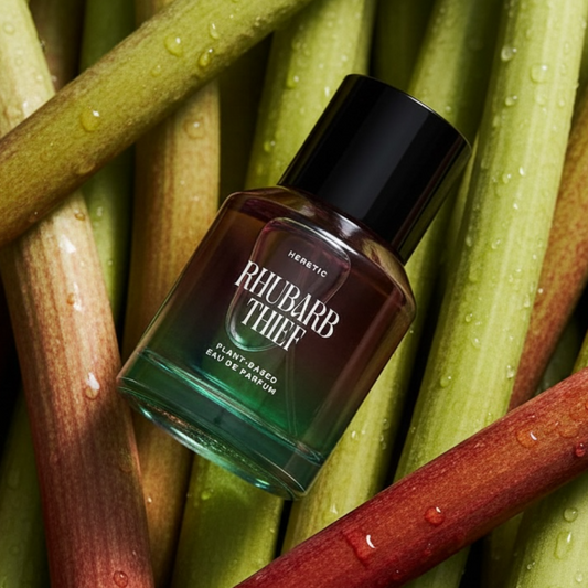 Heretic Parfum Rhubarb Thief perfume styled in a fresh, green setting