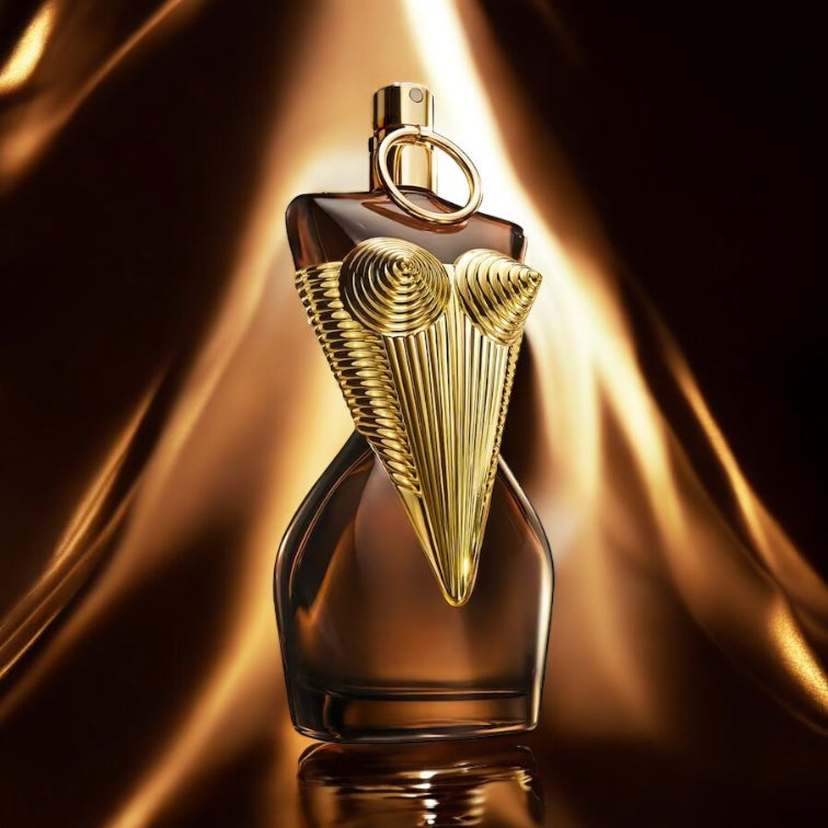 Jean Paul Gaultier Gaultier Divine Elixir perfume sample – golden bottle radiating luxury in a sunlit, feminine setting
