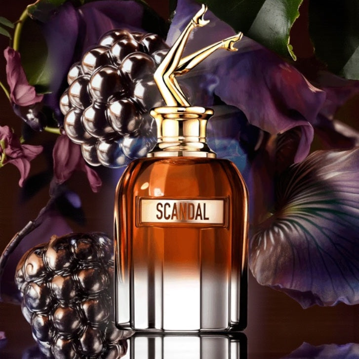 Jean Paul Gaultier Scandal Elixir perfume styled in a bold, dramatic setting
