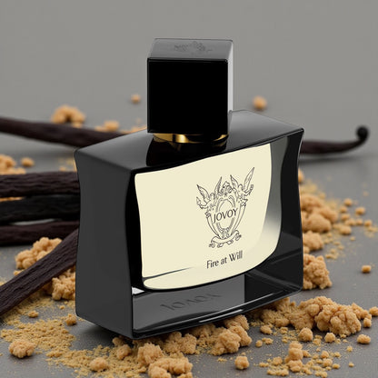 Jovoy Fire At Will perfume styled in a warm, elegant setting