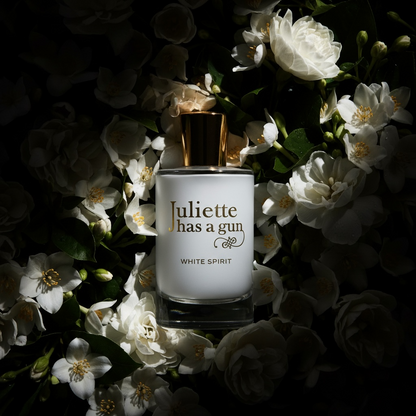 Juliette Has a Gun White Spirit styled with white florals and modern woody accents