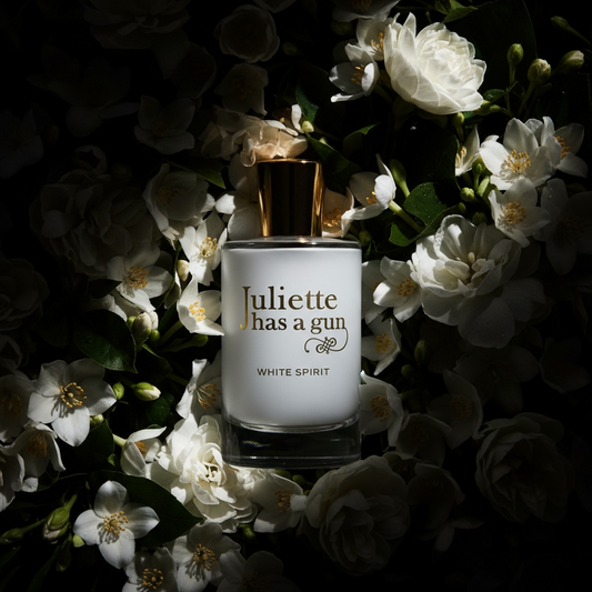 Juliette Has a Gun White Spirit styled with white florals and modern woody accents