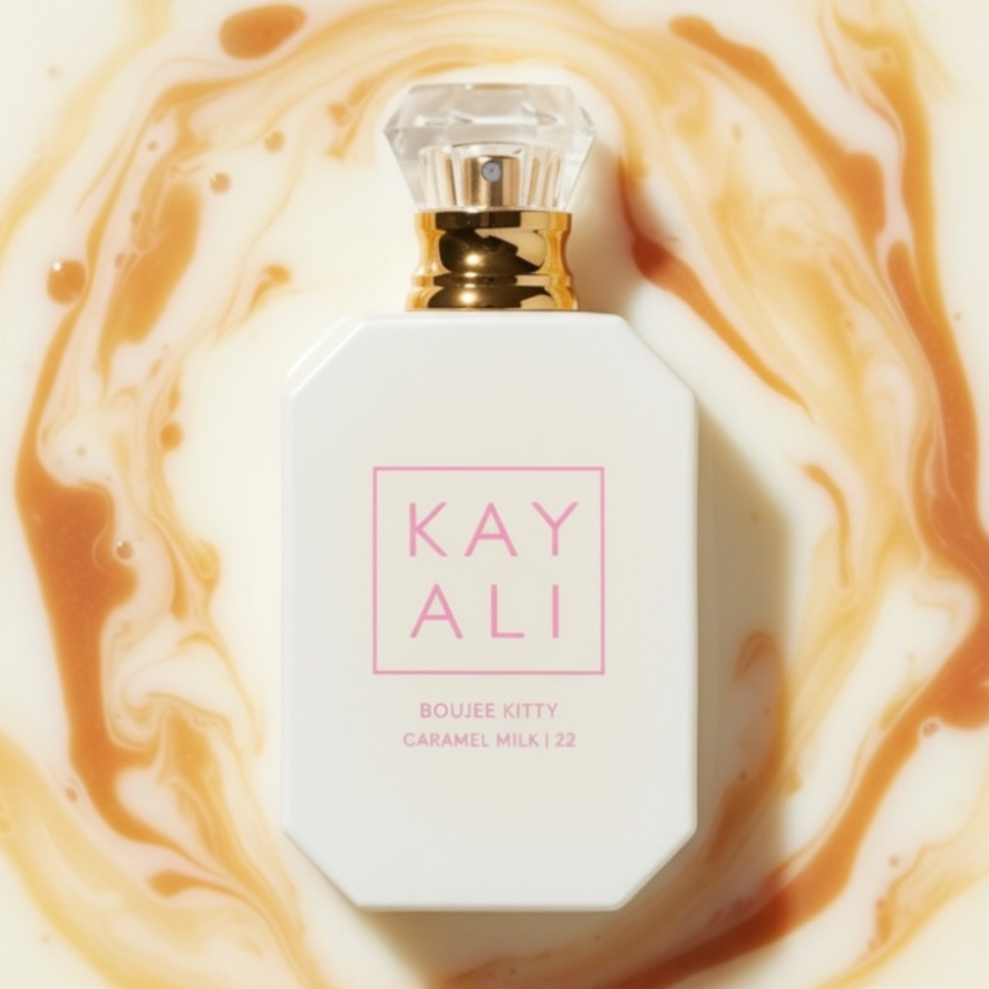 Kayali Boujee Kitty Caramel Milk 22 styled with salted caramel, white chocolate and creamy vanilla
