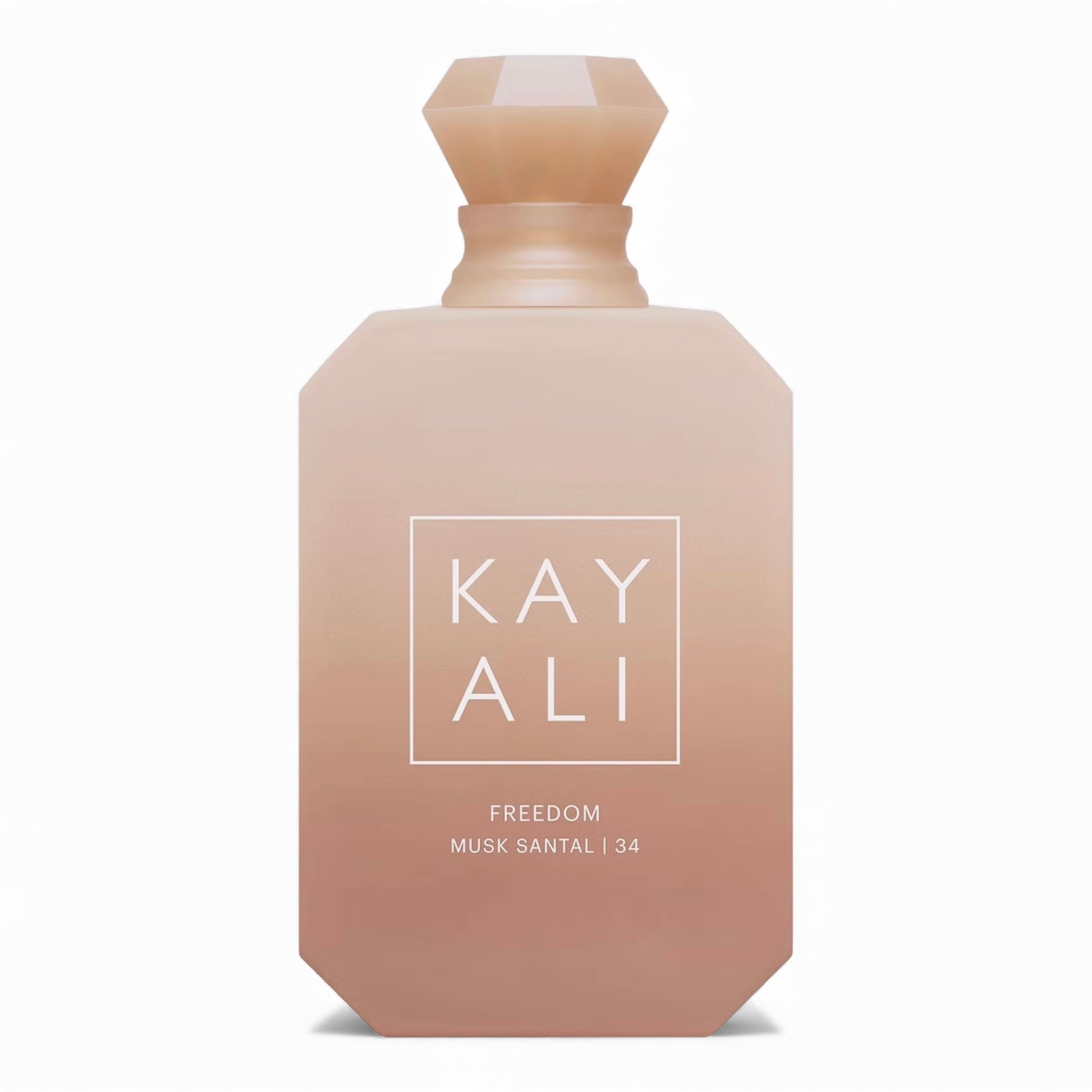 Kayali Freedom Musk Santal 34 fragrance sample, a warm sheer scent with freesia, sandalwood and amber shown in retail bottle for decanting.
