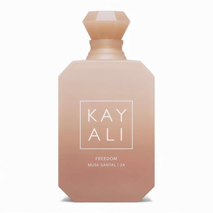 Kayali Freedom Musk Santal 34 fragrance sample, a warm sheer scent with freesia, sandalwood and amber shown in retail bottle for decanting.