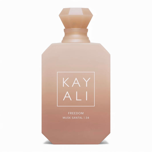 Kayali Freedom Musk Santal 34 fragrance sample, a warm sheer scent with freesia, sandalwood and amber shown in retail bottle for decanting.
