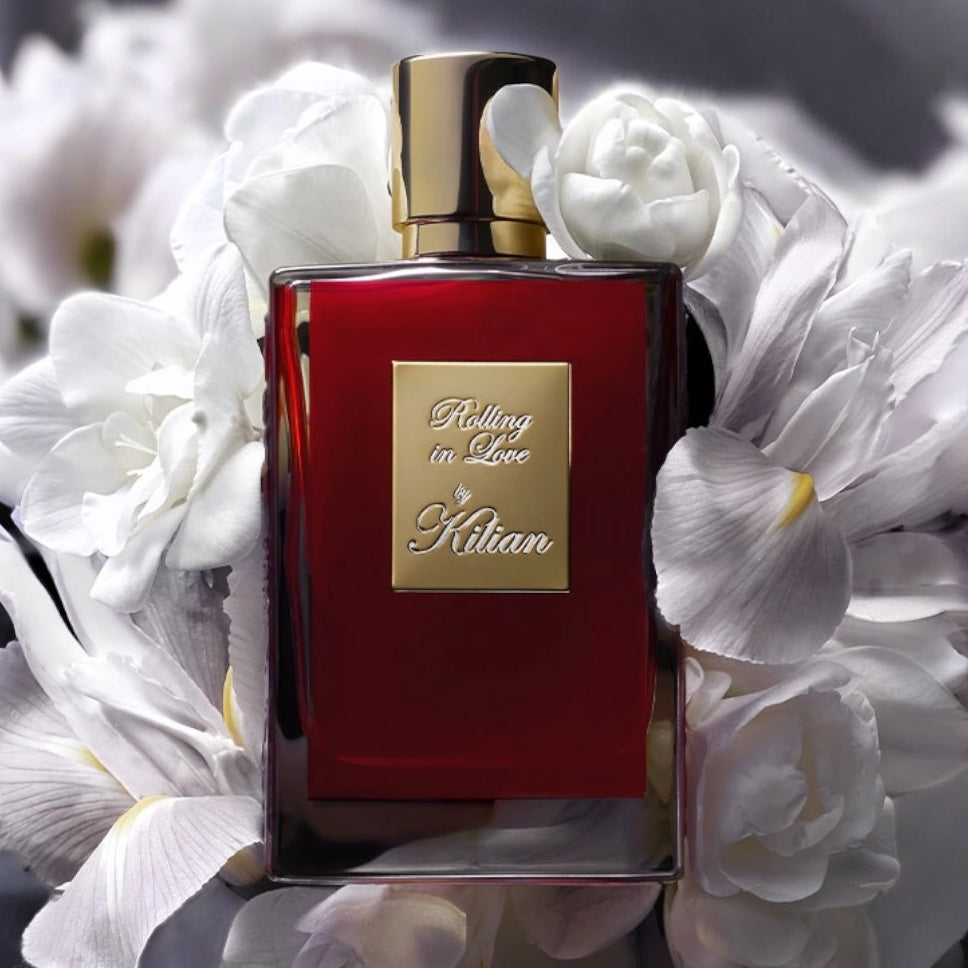 Kilian Rolling in Love perfume sample - soft almond milk and powdery musk fragrance styled in a floral setting
