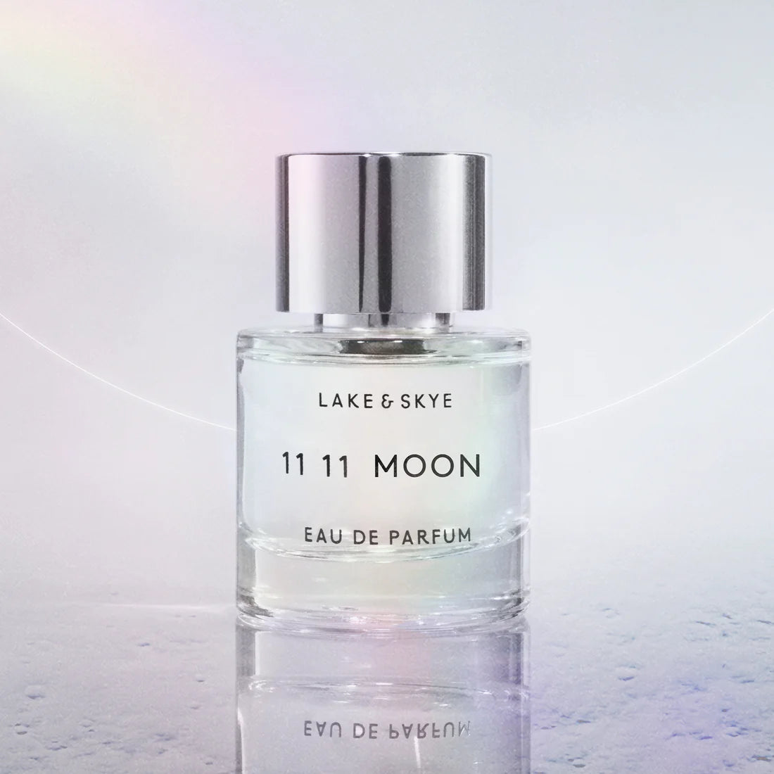 Lake & Skye 11 11 Moon perfume styled in a calm, celestial-inspired setting