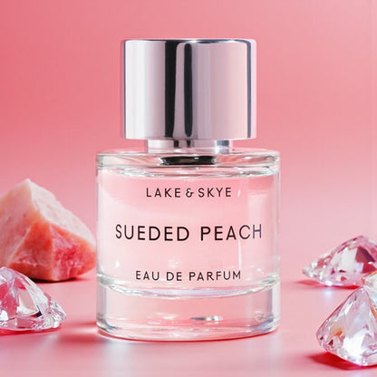 Lake & Skye Sueded Peach perfume sample styled with warm natural tones to reflect its velvety peach character.