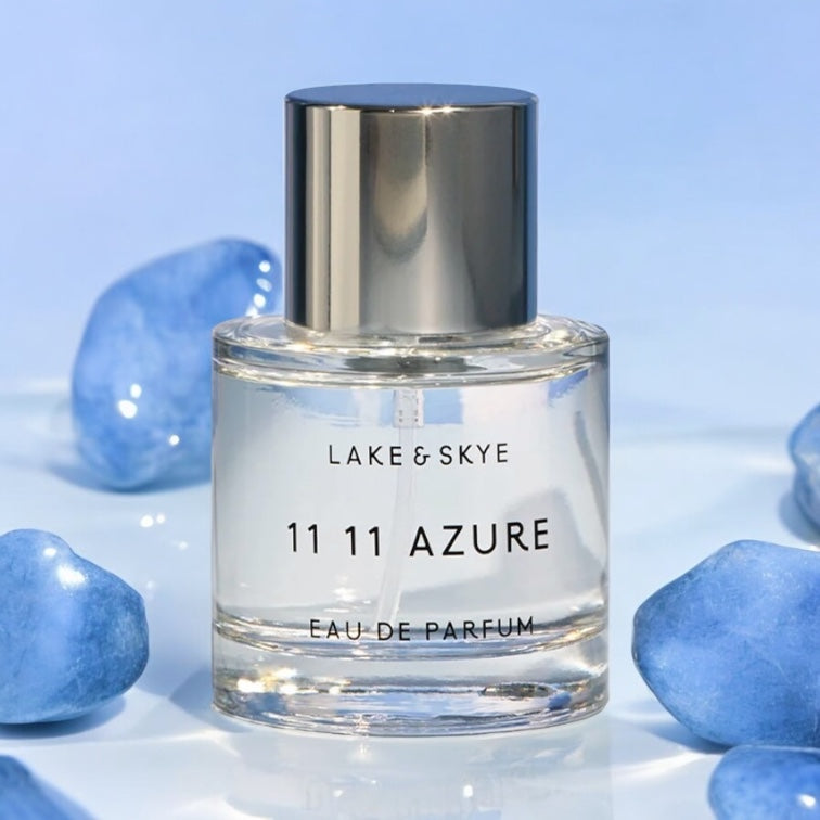 Lake & Skye 11 11 Azure perfume sample – ocean‑inspired bottle in a bright, airy blue crystal setting