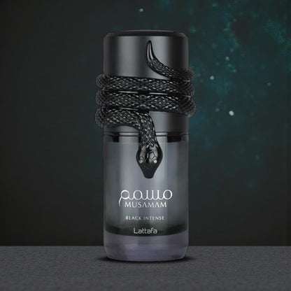 Lattafa Musamam Black Intense perfume sample styled in a dark modern setting to highlight its lavender, cedarwood and tonka notes.