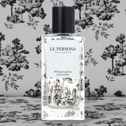 Le Persona Whispering Kiss perfume styled in a warm, intimate setting