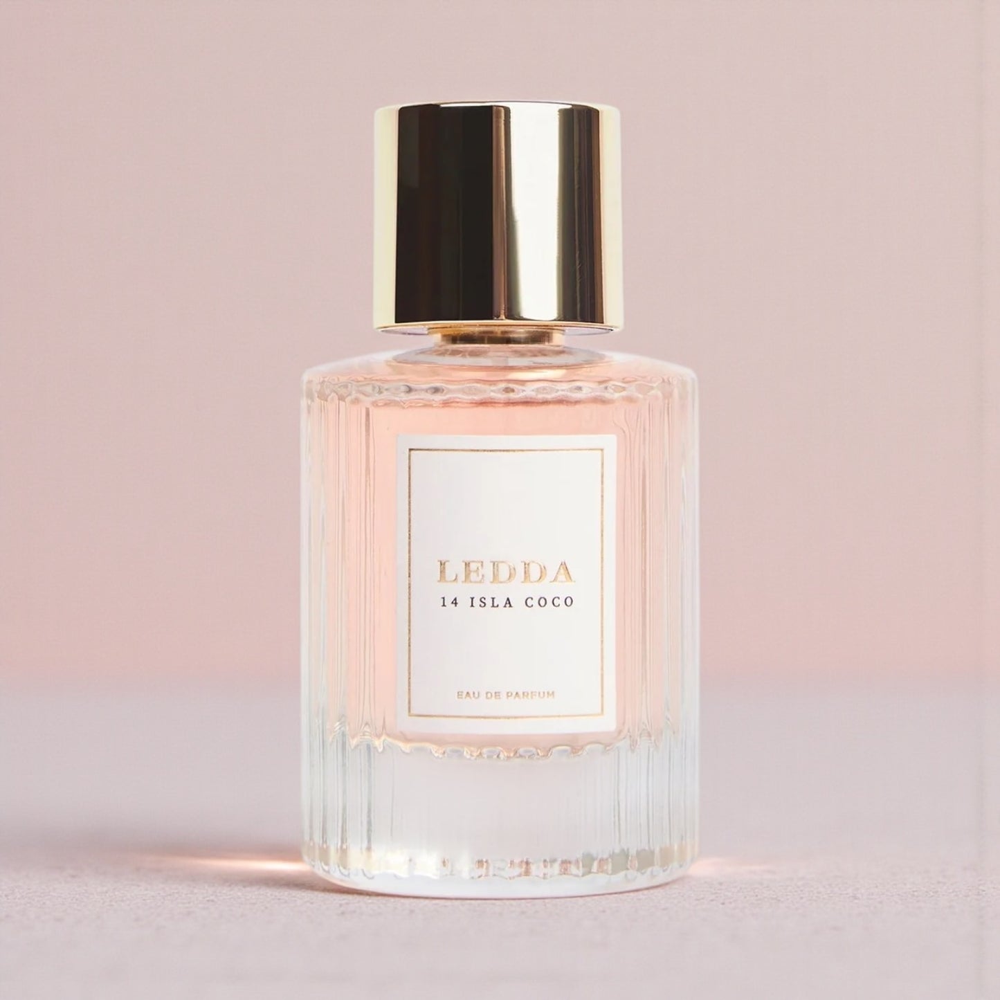 LEDDA 14 Isla Coco perfume styled in a bright, tropical setting