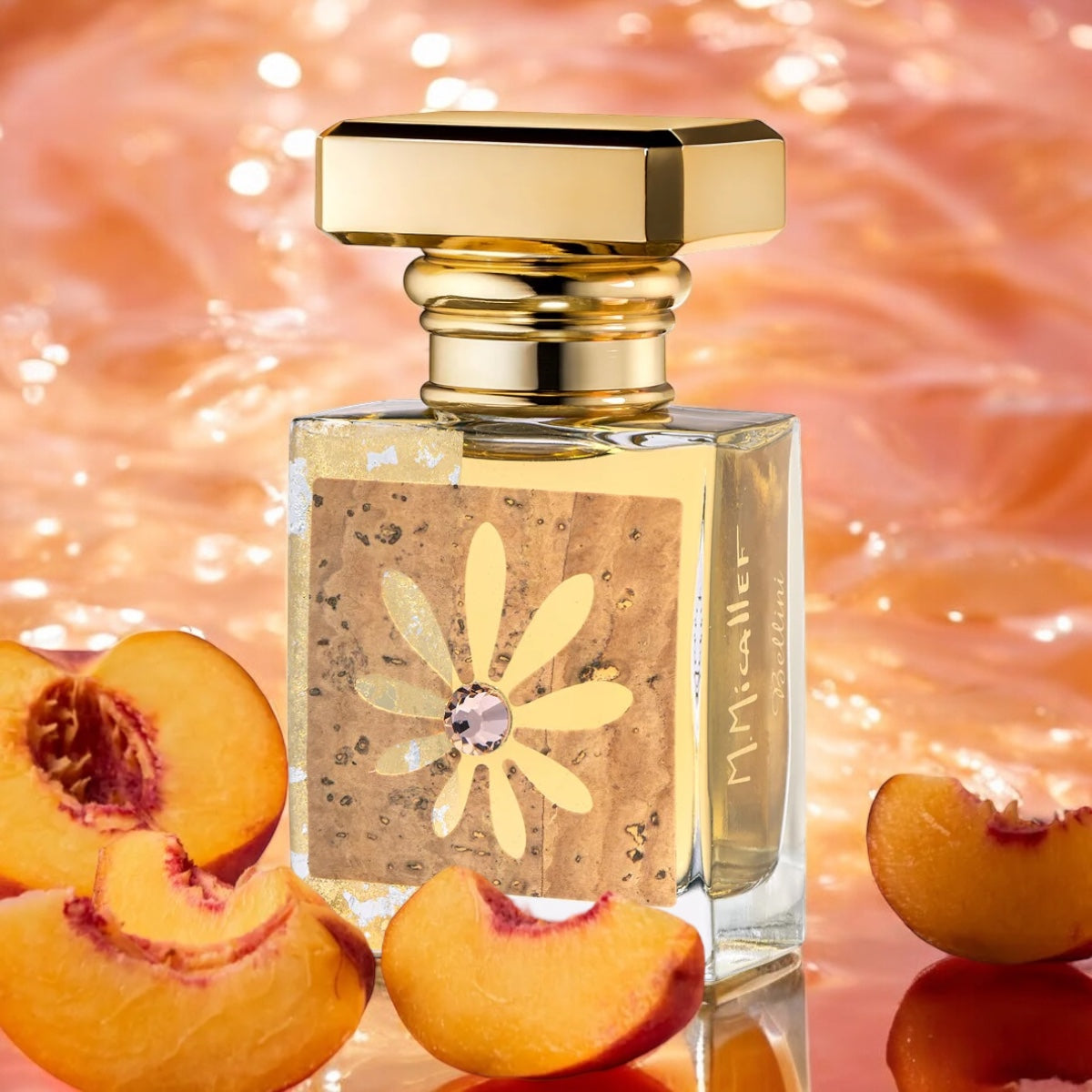 Bellini perfume sample by M. Micallef – radiant peach and rum fragrance with the bottle shown next to peach halves.