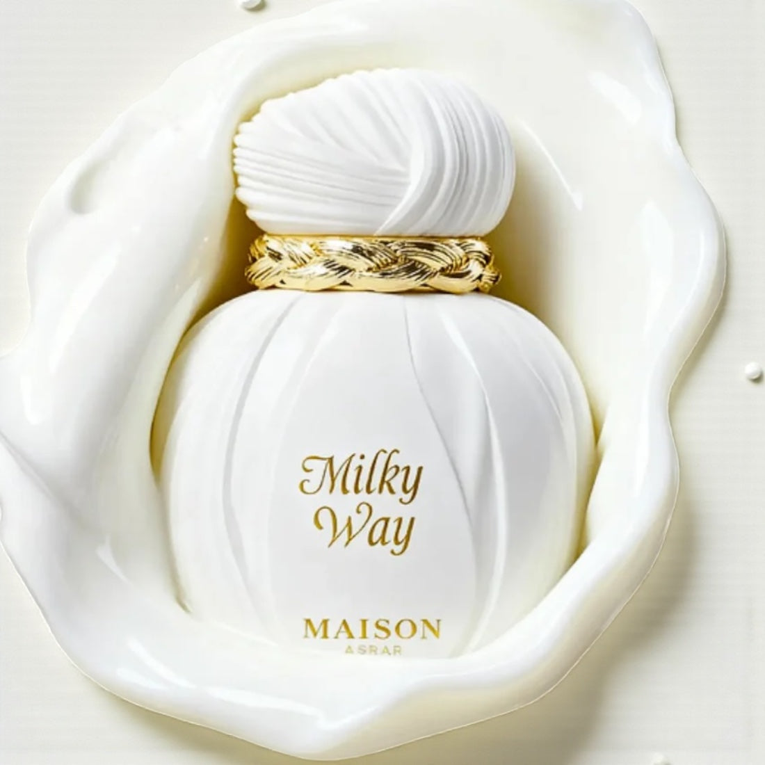 Maison Asrar Milky Way perfume sample styled in a soft warm setting to highlight its caramel, sweet milk and cashmere floral notes.