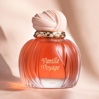 Maison Asrar Vanilla Voyage perfume sample - warm vanilla and caramel fragrance styled in a soft, golden-toned setting.
