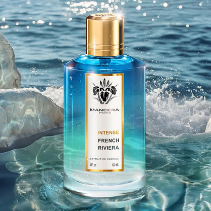 Mancera French Riviera Intense perfume sample - citrus and oud fragrance styled in a warm, golden-hour coastal setting