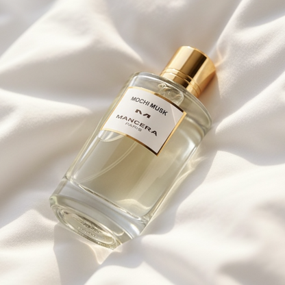 Mancera Mochi Musk perfume styled in a soft sunny setting