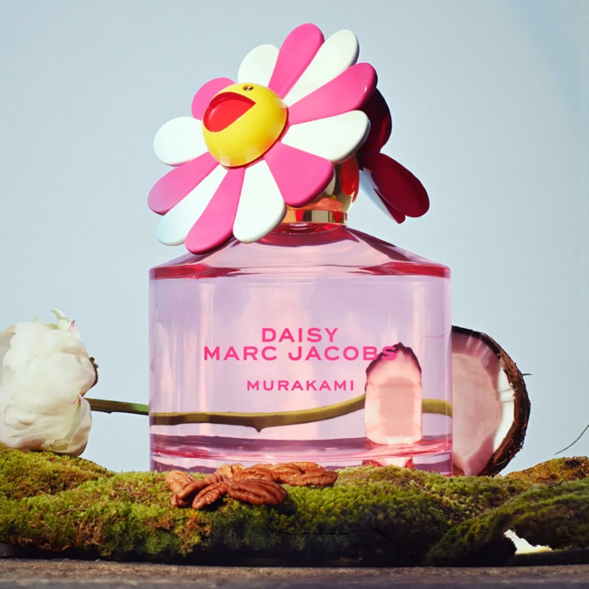 Marc Jacobs Daisy Murakami Pink perfume styled in a soft pastel setting