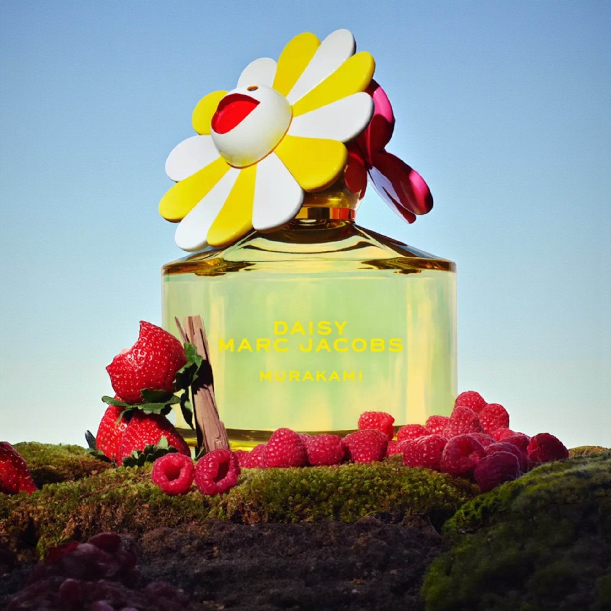 Marc Jacobs Daisy Murakami Yellow perfume styled in a bright, colourful setting