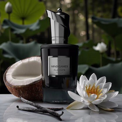 Mind Games Playmate perfume sample – creamy coconut, white floral, and amber notes styled in a peaceful waterlily setting.