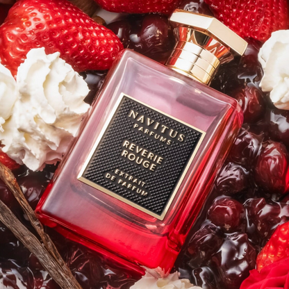 Navitus Reverie Rouge perfume styled with soft red and creamy tones to reflect its floral gourmand character.