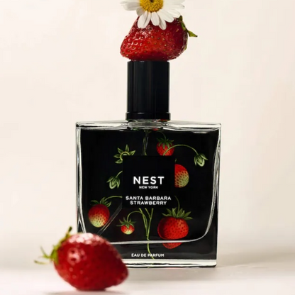 NEST New York Santa Barbara Strawberry perfume styled in a sunny, outdoor setting