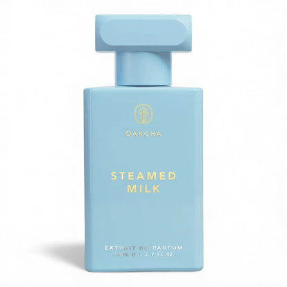 Oakcha Steamed Milk fragrance sample, a creamy gourmand scent with coconut, vanilla milk and jasmine shown in retail bottle for decanting.