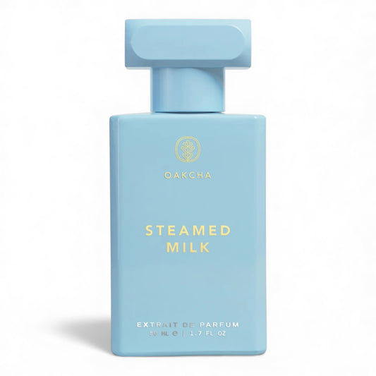 Oakcha Steamed Milk fragrance sample, a creamy gourmand scent with coconut, vanilla milk and jasmine shown in retail bottle for decanting.