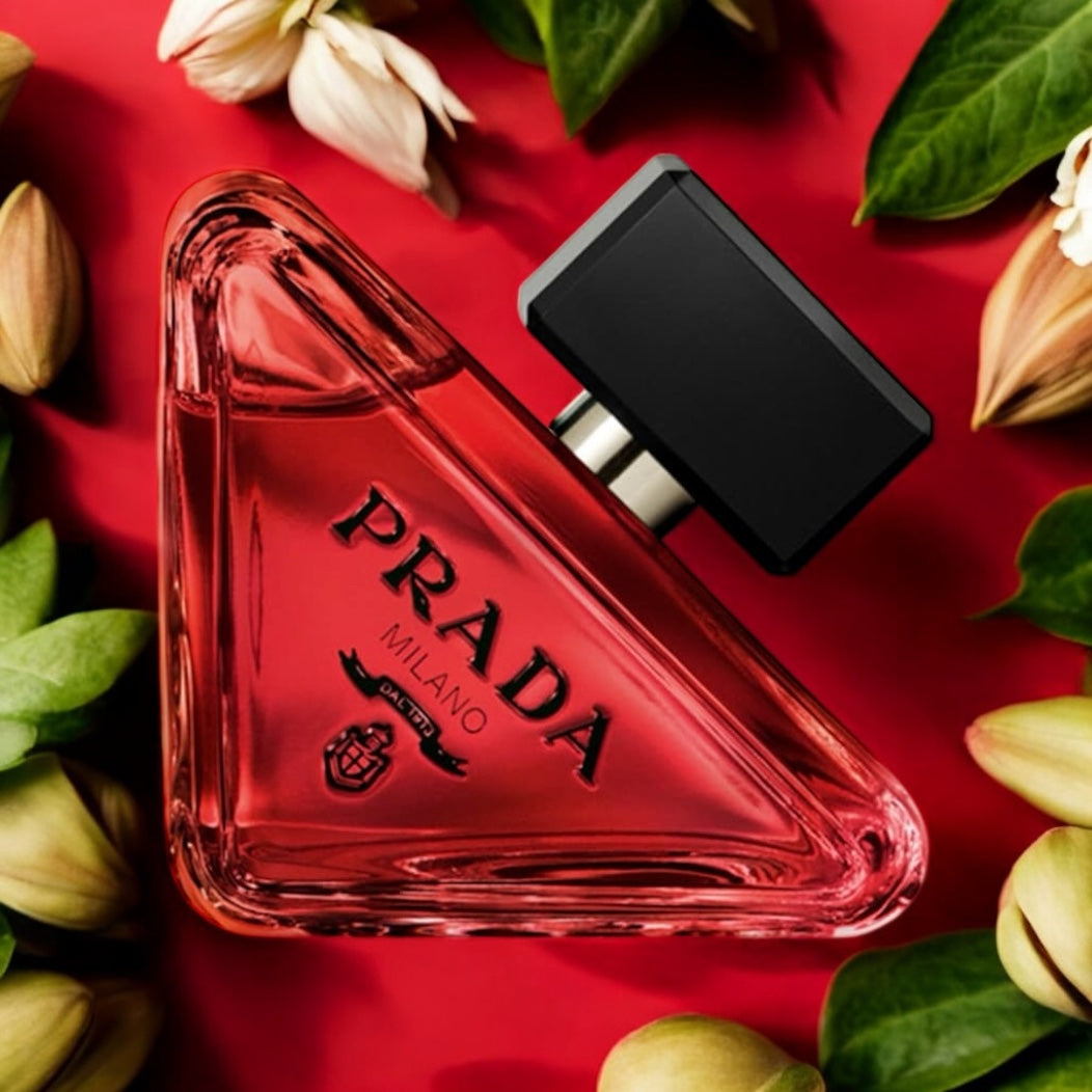 Prada Paradoxe Radical Essence perfume sample – a modern gourmand with salted pistachio, neroli, and sandalwood in a radiant, red setting.