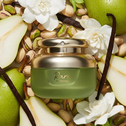 Rare Beauty Rare Beginnings styled with ripe pears, pistachios, white flowers and vanilla