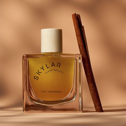 Skylar Fall Cashmere perfume sample – warm vanilla, cinnamon and sandalwood notes styled in a cozy autumn setting.