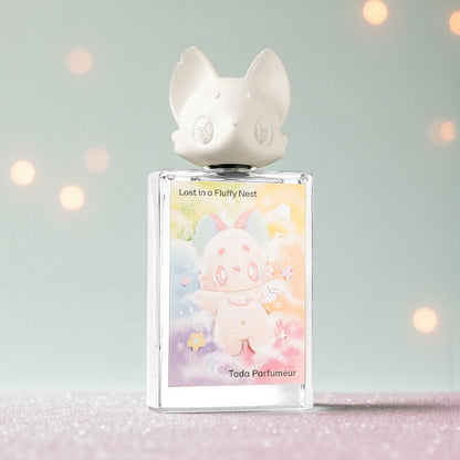Tada Parfumeur Lost in a Fluffy Nest perfume styled in a soft, whimsical setting
