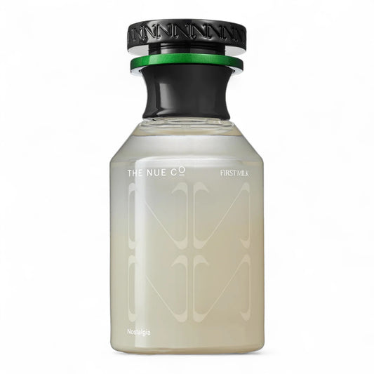 The Nue Co First Milk fragrance sample – retail bottle shown for decanting into 1ml–10ml samples.