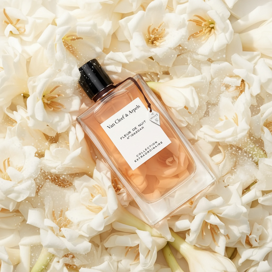 Van Cleef & Arpels Fleur de Nuit perfume styled in a warm sunset setting