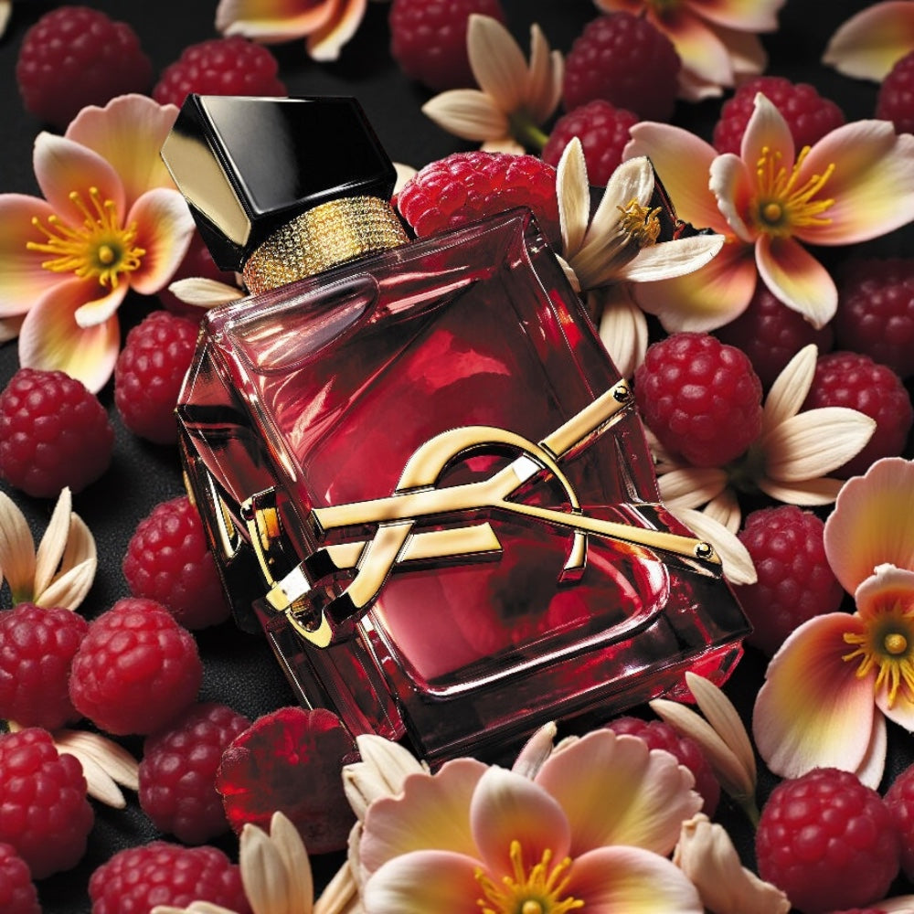 Yves Saint Laurent Libre Berry Crush perfume styled with raspberries and warm, vibrant tones