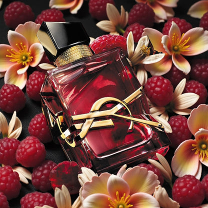 Yves Saint Laurent Libre Berry Crush perfume styled with raspberries and warm, vibrant tones